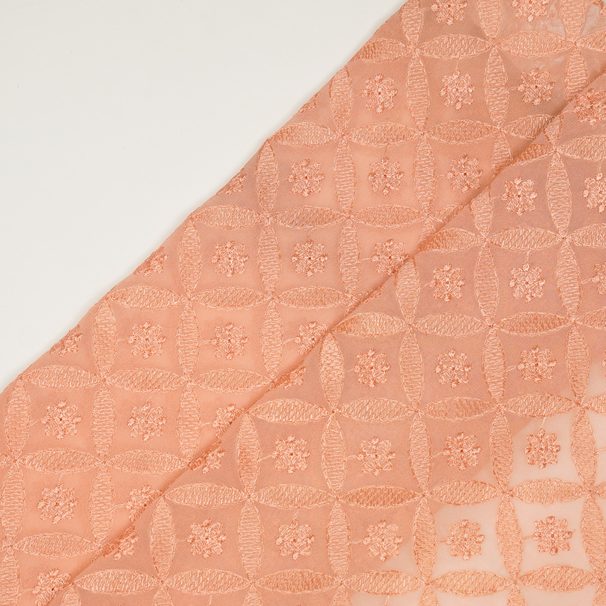 Eshal Peach Viscose Georgette Embroidered Fabric in Jaal Pattern