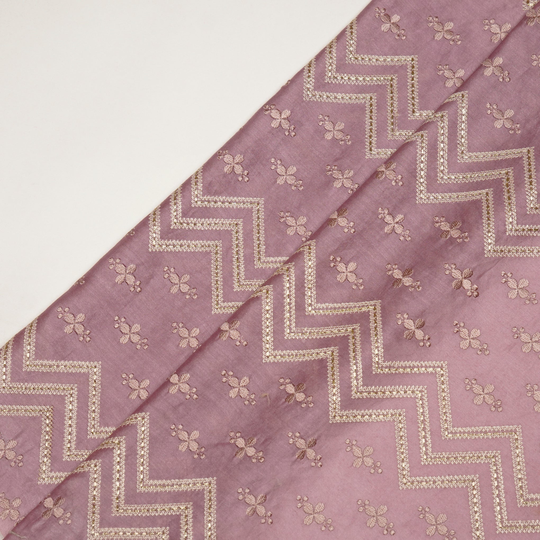 Umi Deep Mauve Viscose Raw Silk Embroidered Fabric in Jaal Pattern